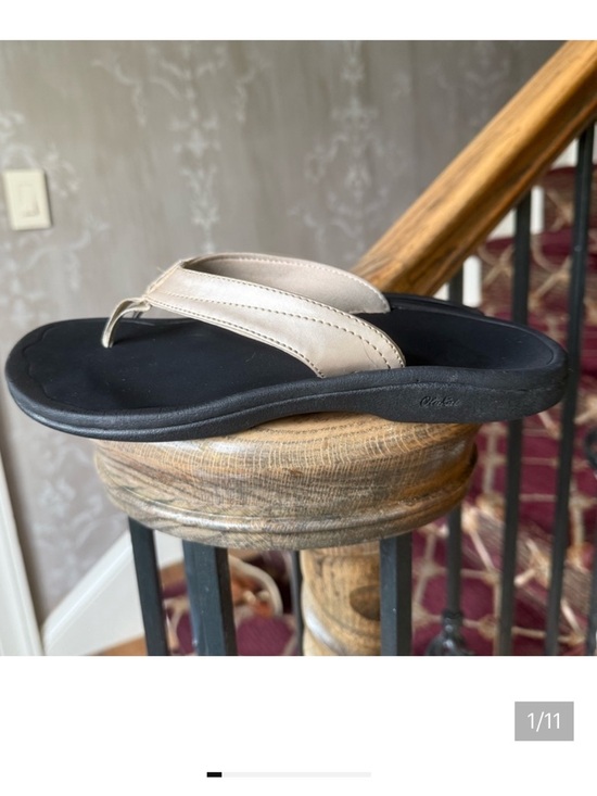 OluKai Shoes - Ola Kai, ladies, size 8, gold and black flip-flop sandal good condition.